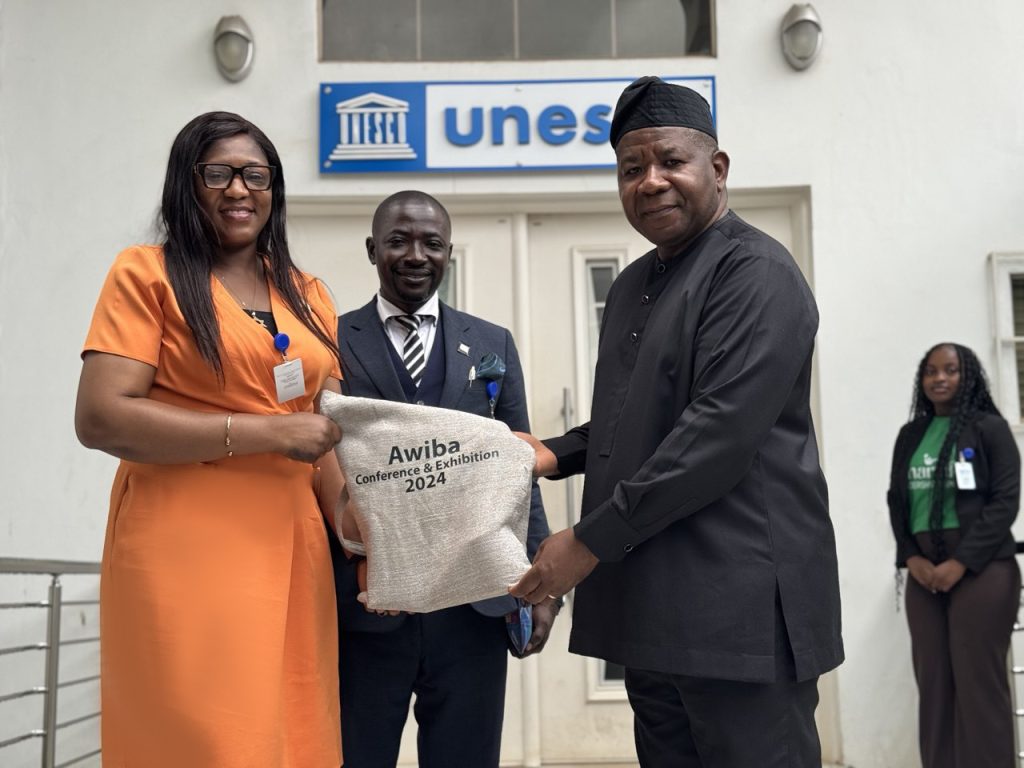 COURTESY VISIT TO UNESCO awiba handing over